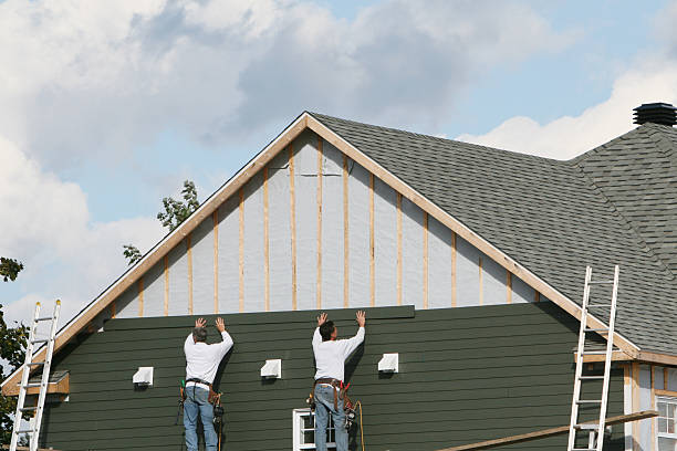 Professional Siding Installation technician working in Falmouth, KY